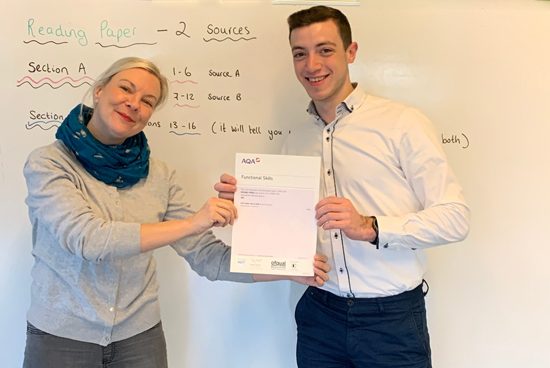 Gateways student receiving his Functional Skills English level 1 certificate